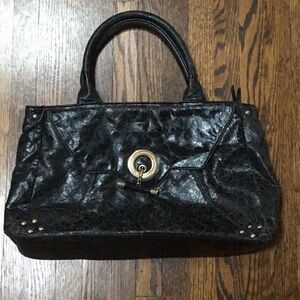 Marciano Black Distressed Leather Satchel with Gold Studs